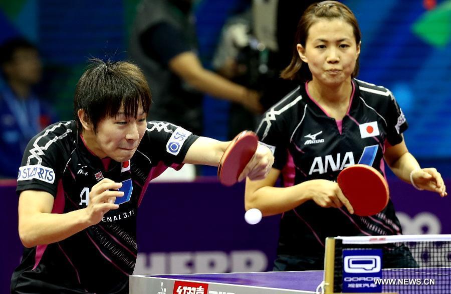 Japan's Niwa Koki/Hirano Sayaka(R) compete against Hong Kong China's Wong Chun Ting/Doo Hoi Kem during Mixed Doubles match at the 53rd Table Tennis World Championships in Suzhou, city of east China's Jiangsu Province, on April 29, 2015. Hong Kong China's Wong Chun Ting/Doo Hoi Kem won 4-0. (Xinhua/Yang Shiyao) 