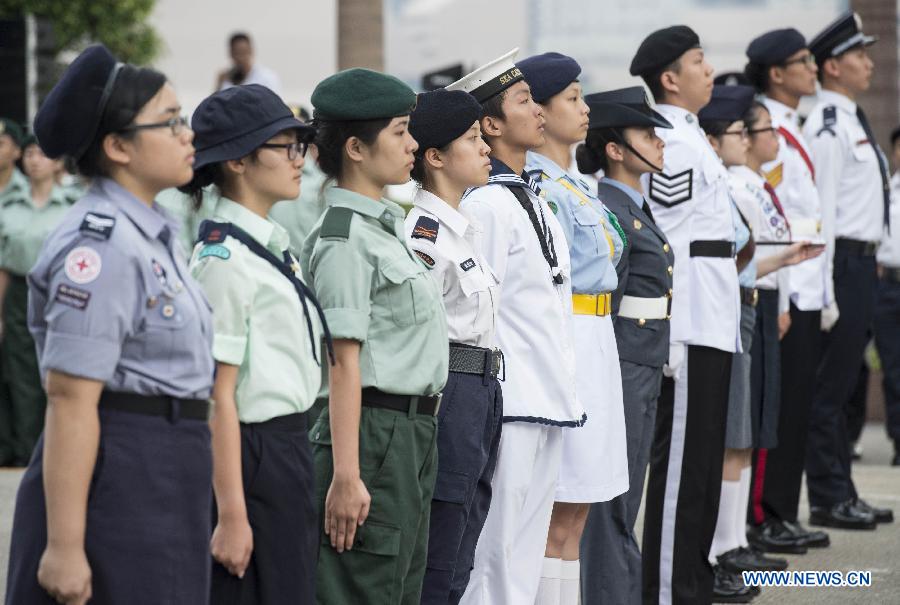 Young people attend a national flag-raising ceremony in Hong Kong, south China, May 4, 2015, to celebrate the Chinese Youth Day marking the May 4th Movement that happened on May 4, 1919, ushering in the new-democratic revolution in China. (Xinhua/Lui Siu Wai)