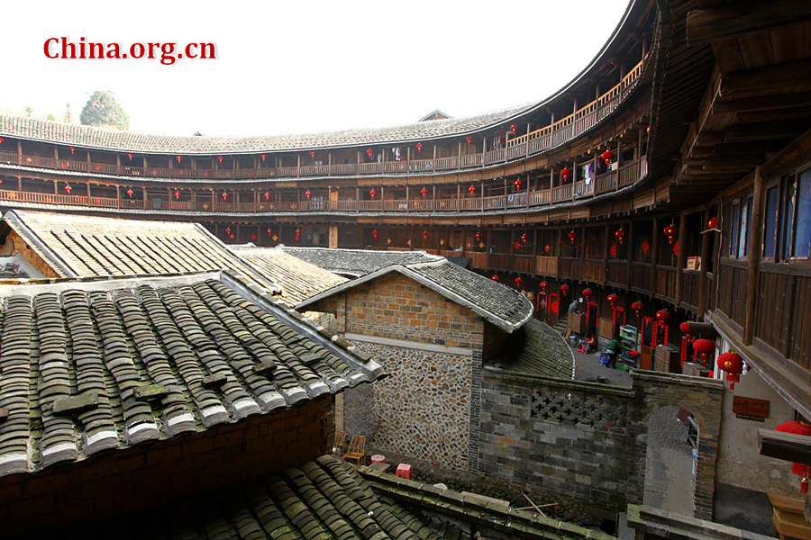 Built on a base of stone, the thick walls of Tulou were packed with dirt and fortified with wood or bamboo internally. The architectural arts of the Fujian Tulou can be traced back nearly 1,000 years, and their design incorporates the tradition of fengshui (favorable siting within the environment).