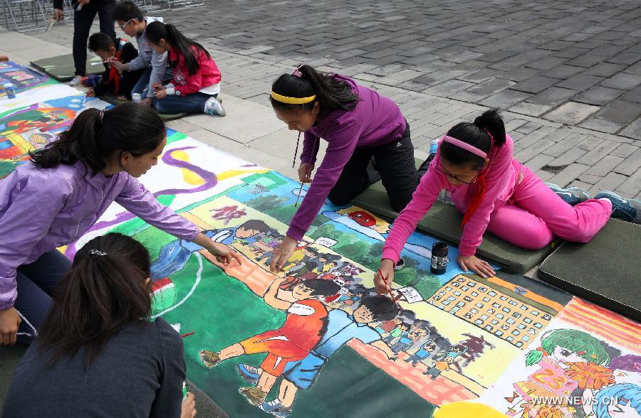 The ten-day painting and calligraphy exhibition, displaying more than 300 works created by primary school students, opened in Beijing Tuesday. 