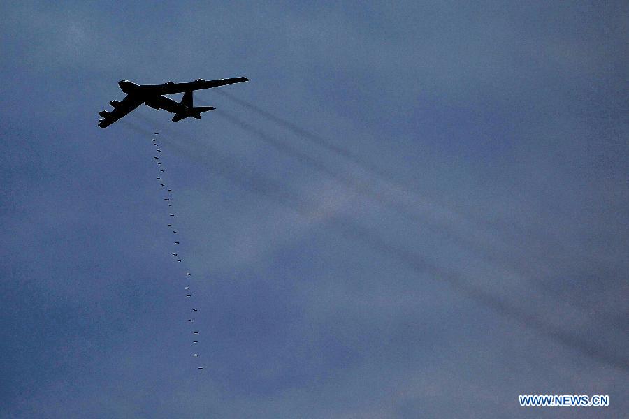 A US strategic bomber B-52 takes part in joint Jordan-US maneuvers during the 'Eager Lion' military exercises in Mudawwara, near the border with Saudi Arabia, some 280 kilometres south of the Jordanian capital, Amman, on May 18, 2015.
