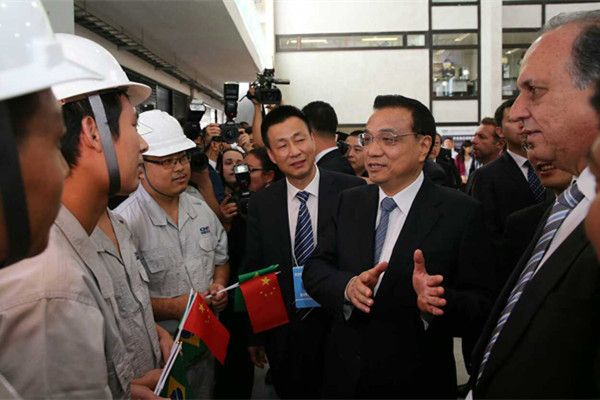 Premier Li rides on new China-made train in Rio de Janeiro