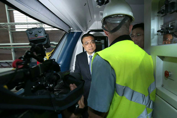 Premier Li rides on new China-made train in Rio de Janeiro