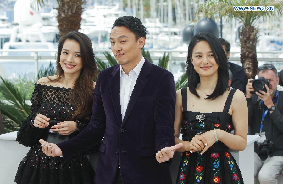 Cast members Shu Qi (L), Chang Chen (C) and Zhou Yun of the film 'Nie Yinniang' (the Assassin) pose for photos at the photocall during the 68th Cannes Film Festival in Cannes, France, on May 21, 2015. The film 'Nie Yinniang' (the Assassin) would premiere at the 68th Cannes Film Festival on Thursday.