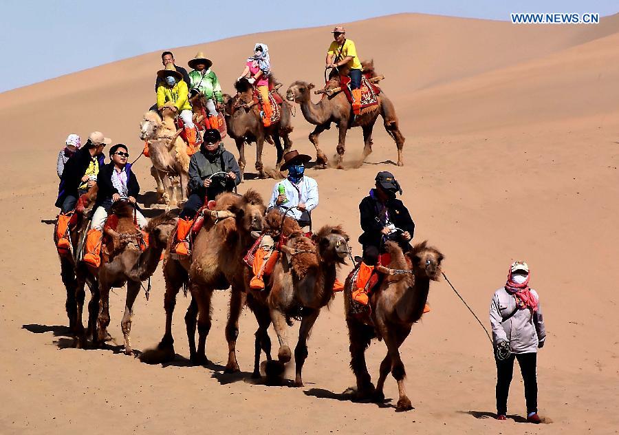 Consisting of a group of sand dunes, the Mingsha Hill is famous for its desert scenery and the mysterious sound made by wind when blowing over its surface.