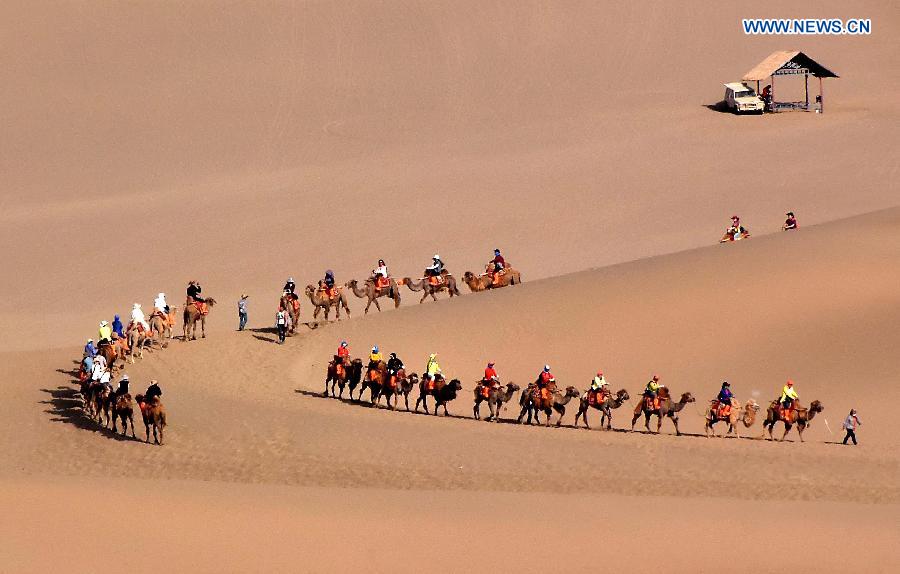 Consisting of a group of sand dunes, the Mingsha Hill is famous for its desert scenery and the mysterious sound made by wind when blowing over its surface.