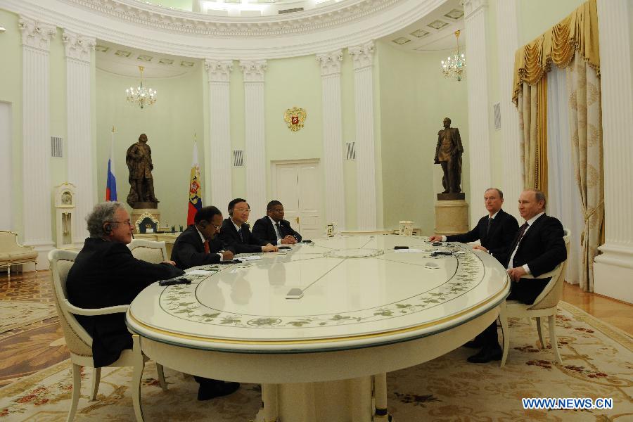 Russian President Putin (1st R) meets with delegates of BRICS High Representatives for Security Issues in Kremlin, Moscow, Russia, on May 26, 2015. 