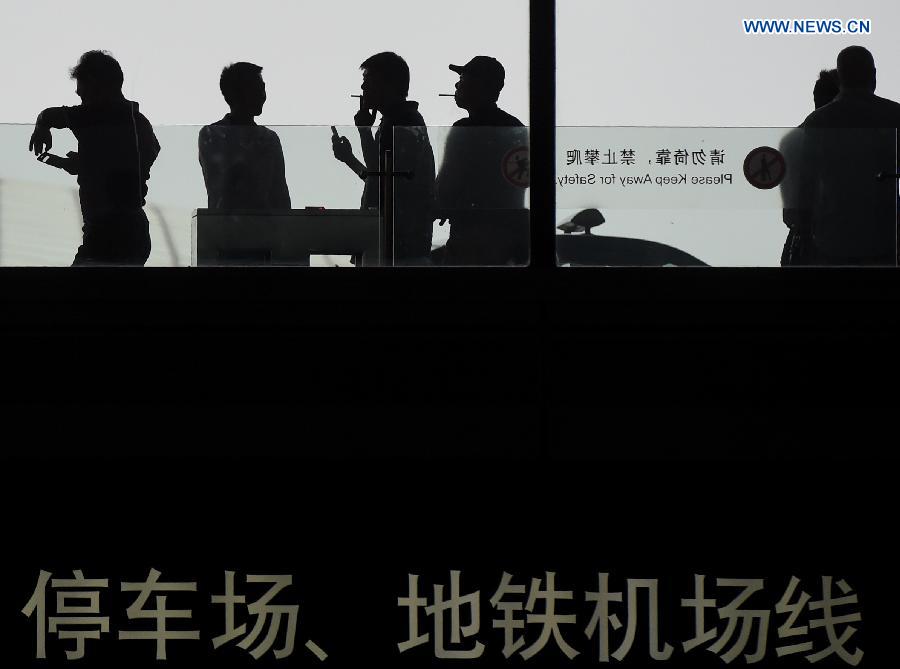 A new smoking ban took effect in Beijing on June 1. The new ban, the country's toughest to date, prohibits smoking in all the city's indoor public places, workplaces, and on public transportation. Following the ban, the capital's airport on Monday closed three smoking rooms in its three terminals and opened 11 smoking spaces outside.