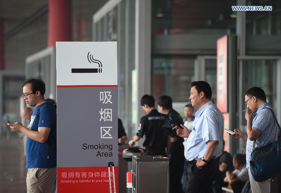 A new smoking ban took effect in Beijing on June 1. The new ban, the country's toughest to date, prohibits smoking in all the city's indoor public places, workplaces, and on public transportation. Following the ban, the capital's airport on Monday closed three smoking rooms in its three terminals and opened 11 smoking spaces outside.