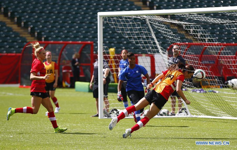 Canada's players attend a training session in the Commonwealth Stadium one day ahead of the opening match with China at the 2015 FIFA Women's World Cup in Edmonton, Canada, June 5, 2015.