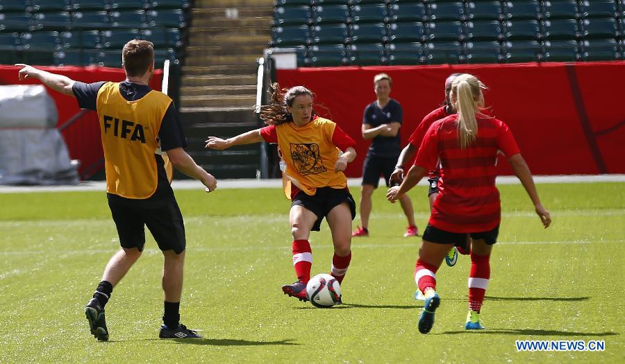 Canada's players attend a training session in the Commonwealth Stadium one day ahead of the opening match with China at the 2015 FIFA Women's World Cup in Edmonton, Canada, June 5, 2015.