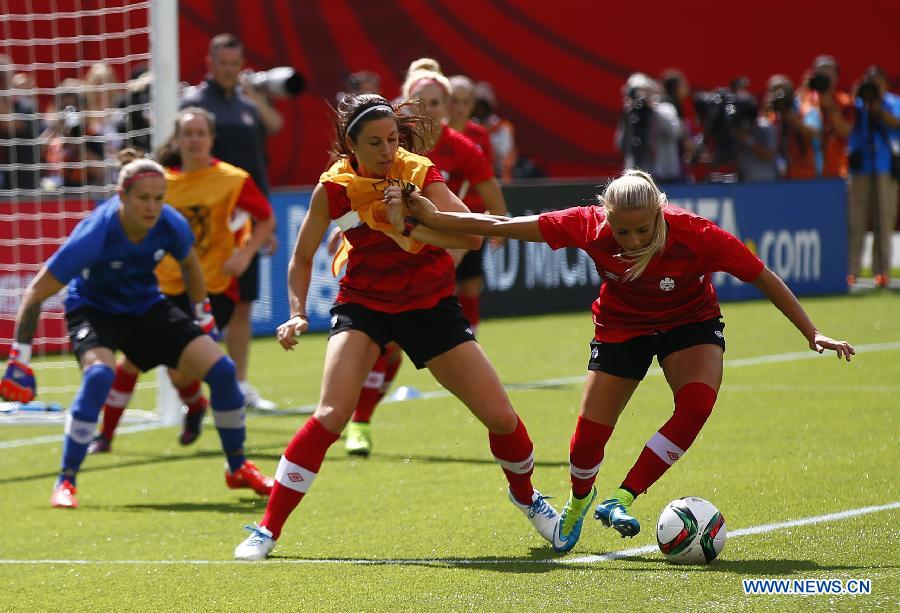 Canada's players attend a training session in the Commonwealth Stadium one day ahead of the opening match with China at the 2015 FIFA Women's World Cup in Edmonton, Canada, June 5, 2015.