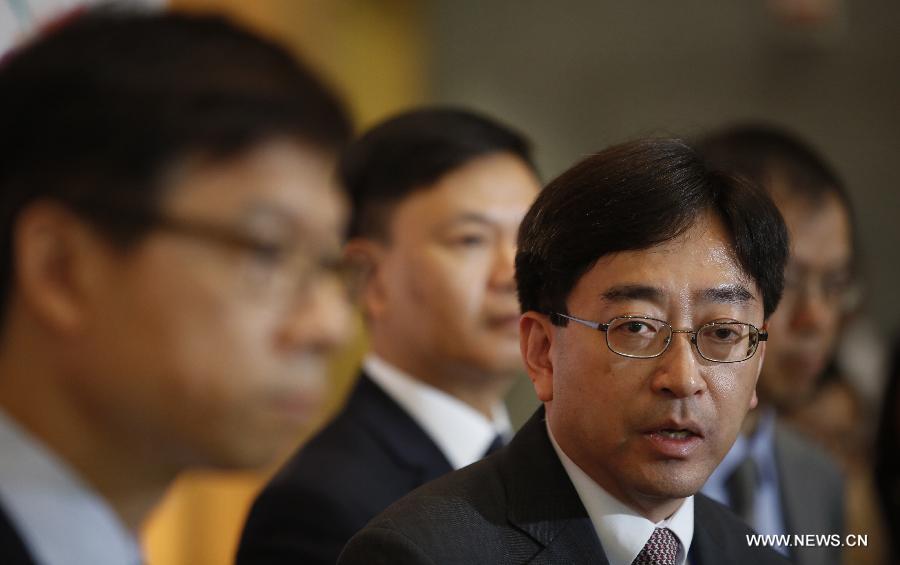 Hong Kong's Secretary for Food and Health Ko Wing-man attends a press conference in Hong Kong, south China, June 8, 2015. 