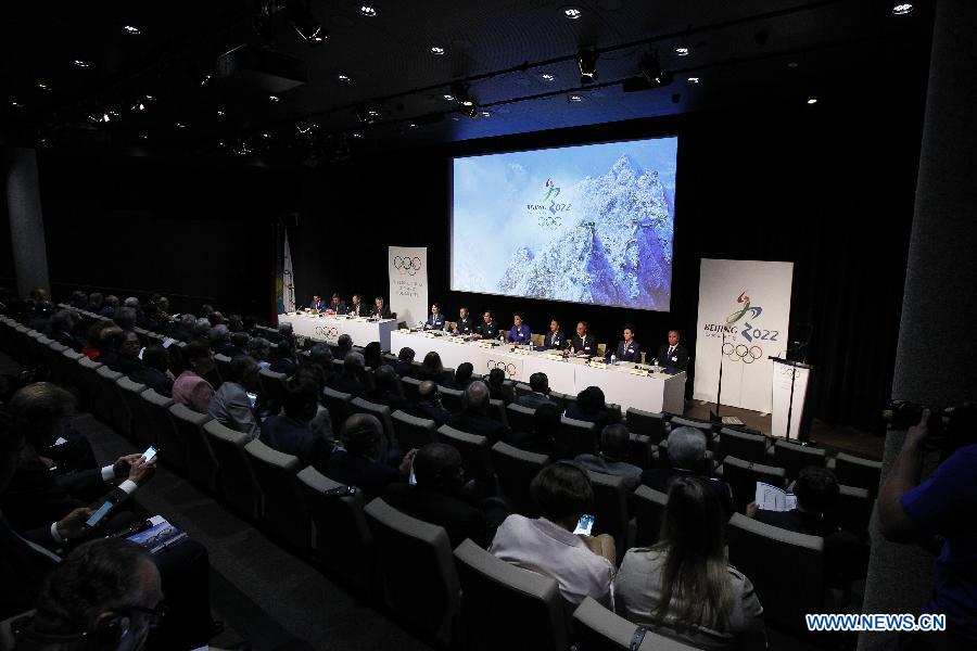 A general view shows the China Beijing 2022 Winter Olympics bid delegation groups at the presentation of Beijing Candidate City's bid for the 2022 Winter Olympic games, at the IOC Museum in Lausanne, Switzerland, on June 9, 2015.