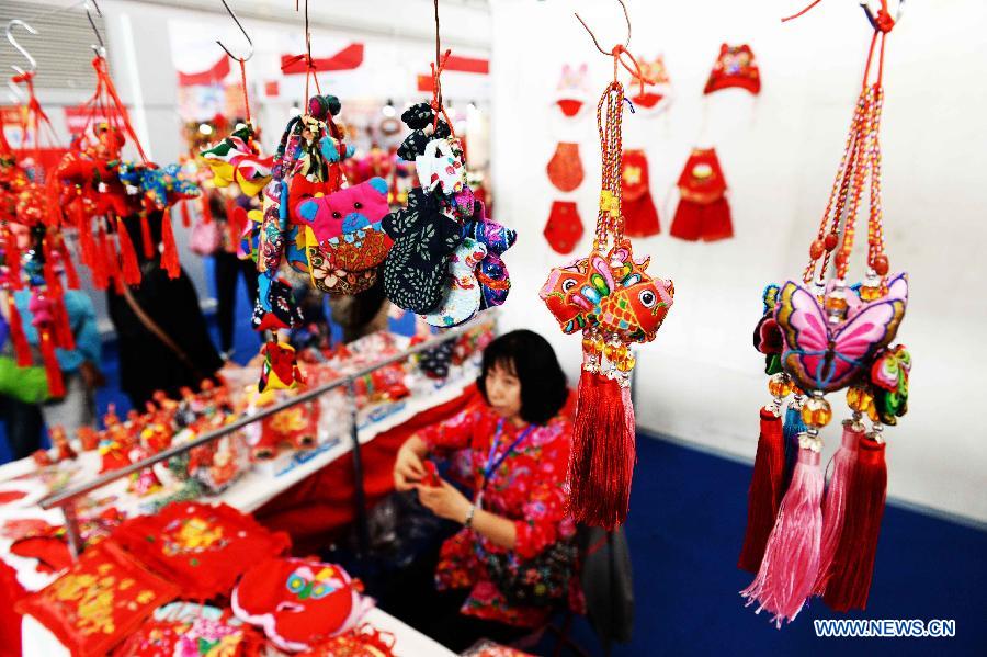 Hand-woven creations are displayed during an intangible cultural heritages show in Harbin, capital of northeast China's Heilongjiang Province, June 11, 2015.