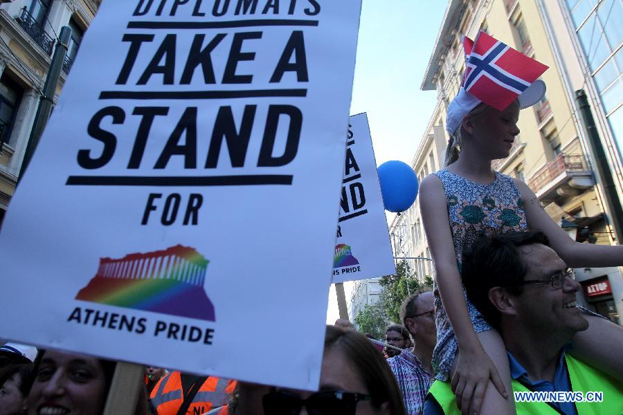 Protesters take part in an annual Gay Pride rally in Athens, Greece, June 13, 2015. 