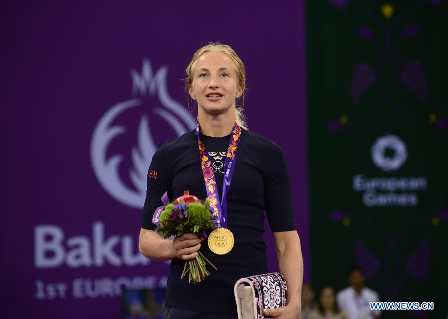 Mattson Sofia of Sweden reacts during the awarding ceremony of the women's 55kg wrestling event at the European Games in Azerbaijan's capital of Baku on June 15, 2015. 