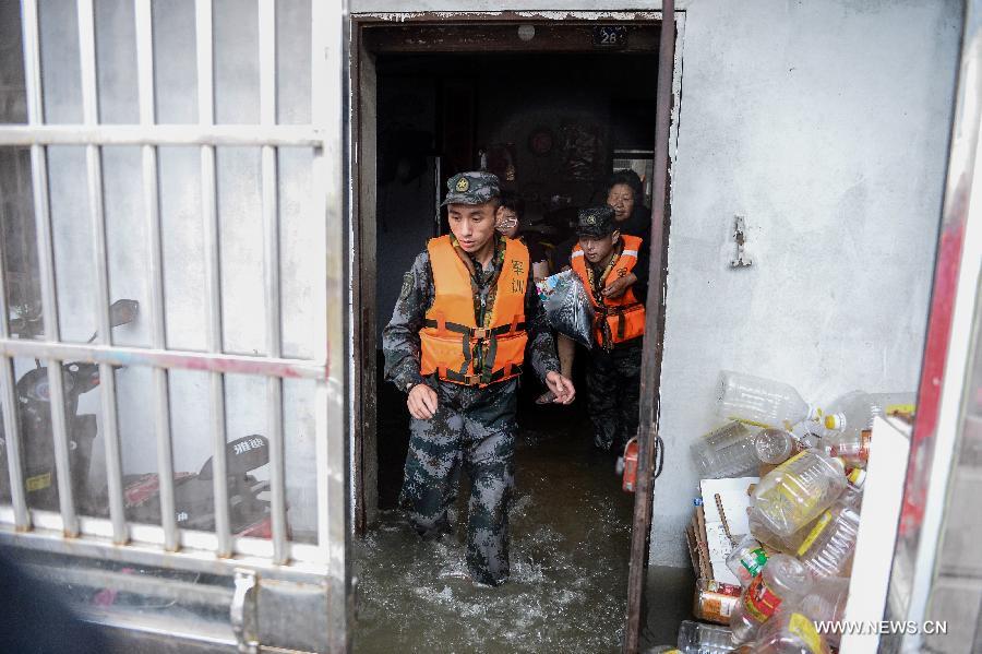 Heavy rainstorms have affected about 65,000 people in the city, causing damages worth over 410 million yuan (about 66 million U.S. dollars). 