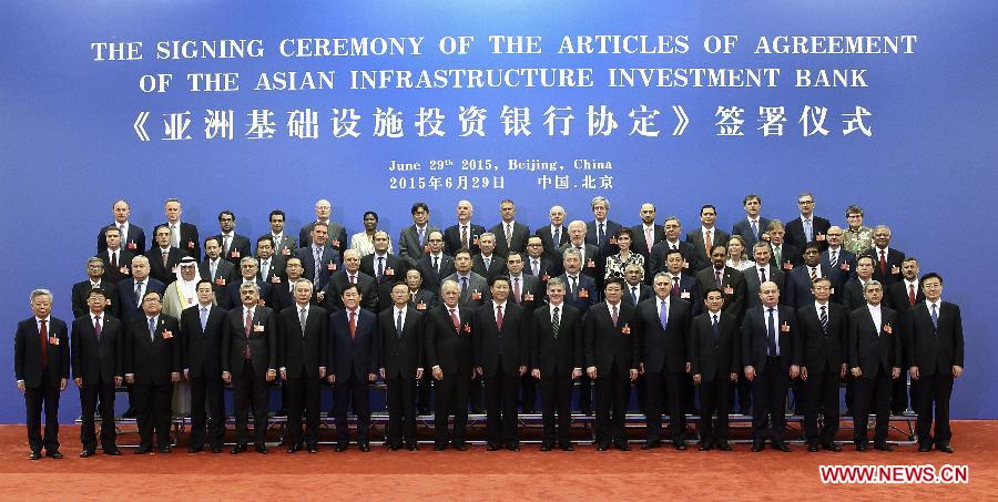 Representatives of the 57 prospective AIIB founding countries signed the agreement on Monday in Beijing