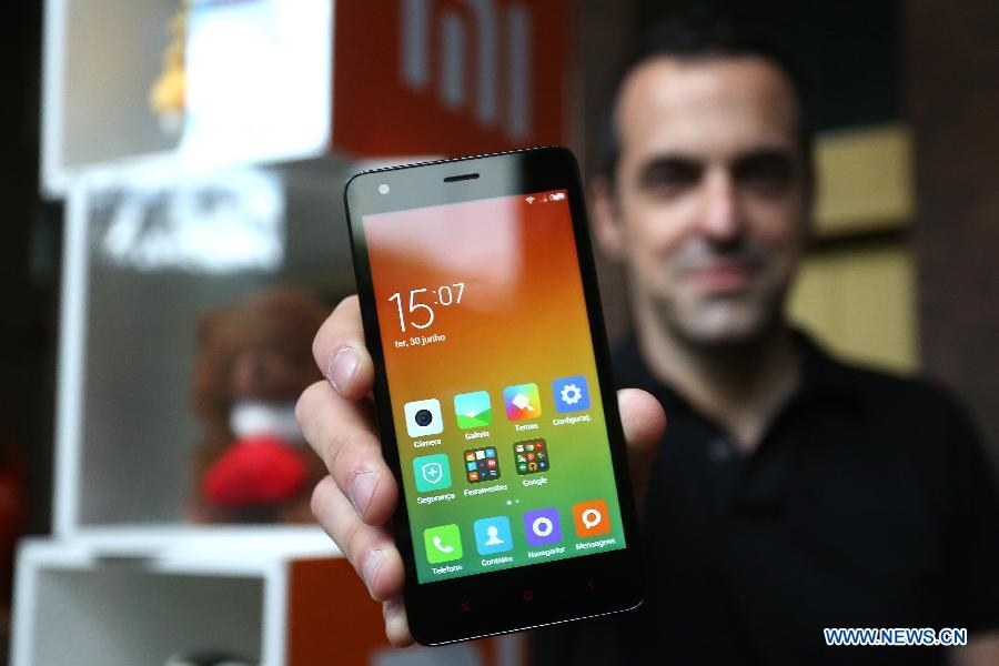 Xiaomi International Vice President Hugo Barra shows 'Redmi 2' after the launch ceremony of Chinese smartphone manufacturer Xiaomi's operation in Brazil, in Sao Paulo June 30, 2015.