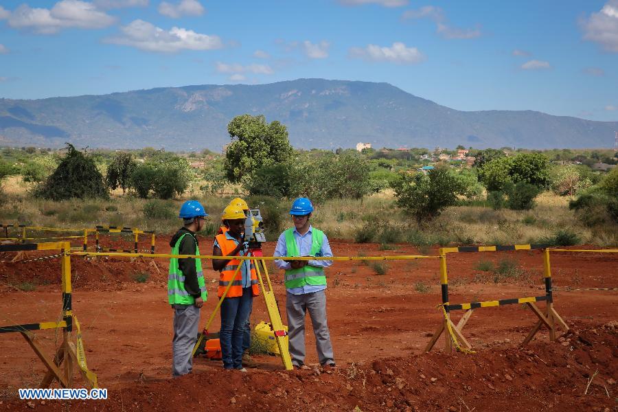 Chinese and Kenyan engineers work on section two of Kenya's Standard Gauge Railway project, in Taita-Taveta, Kenya, on March 19, 2015. 