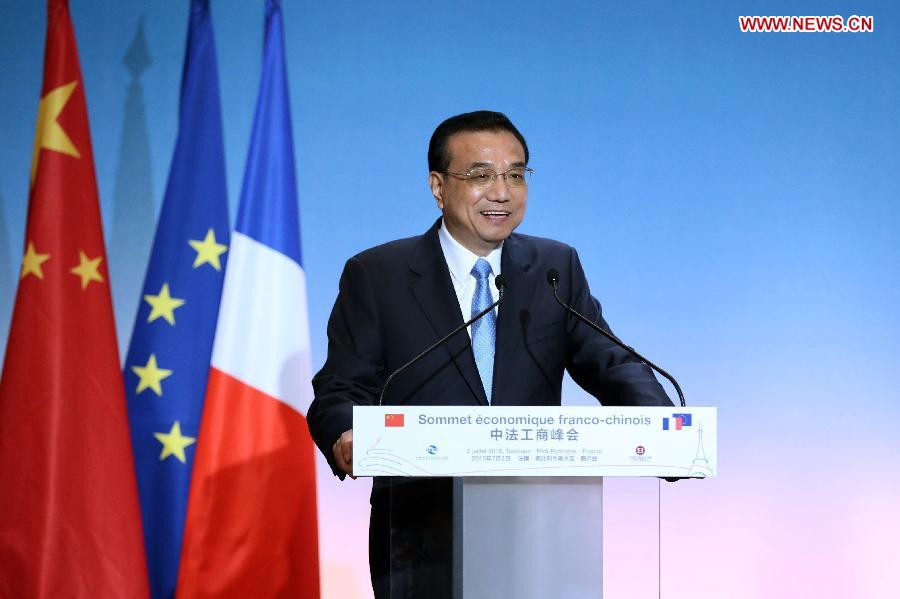 Chinese Premier Li Keqiang addresses the closing ceremony for a business summit in Toulouse, southwestern France, July 2, 2015.
