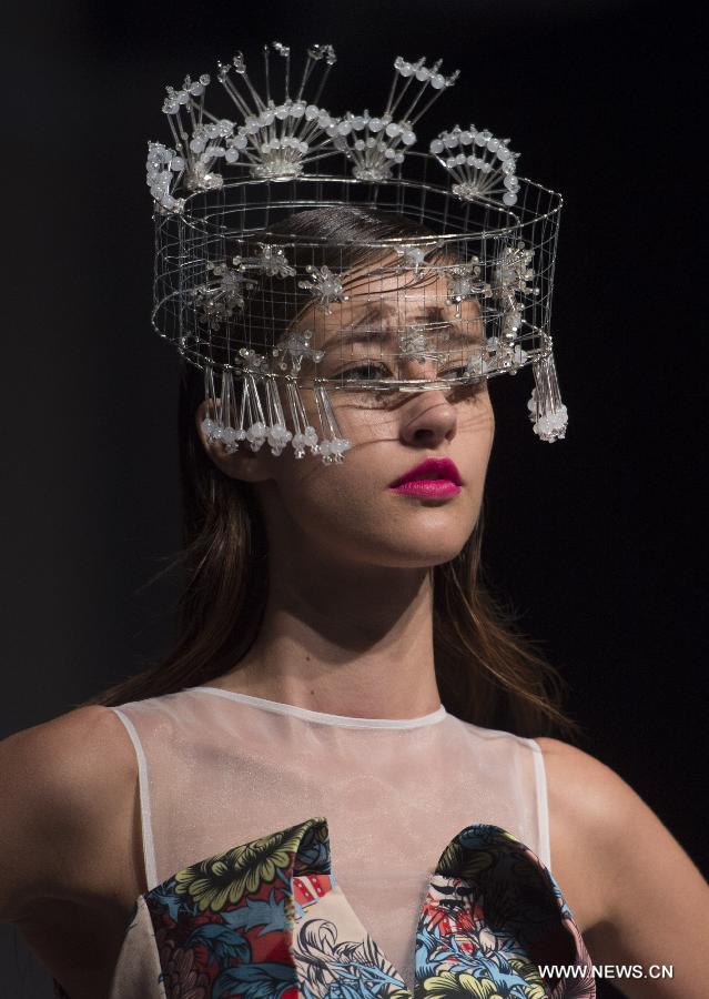 A model displays the creation at the Hong Kong Fashion Week for Spring/Summer in Hong Kong, south China, July 6, 2015.