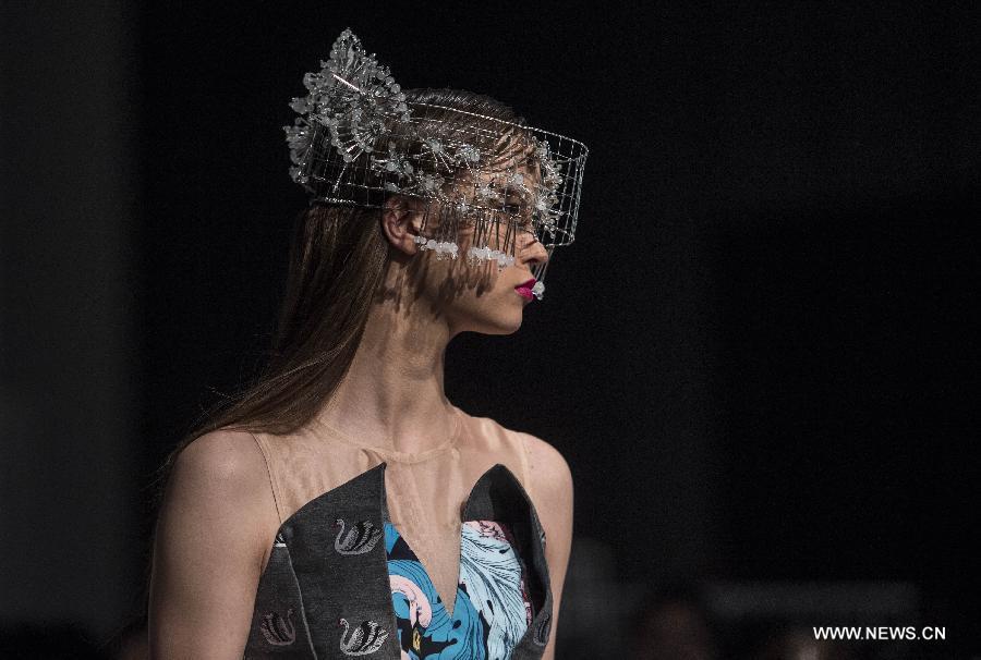 A model displays the creation at the Hong Kong Fashion Week for Spring/Summer in Hong Kong, south China, July 6, 2015.