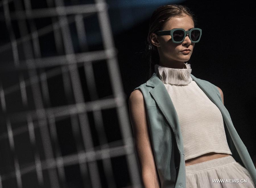 A model displays the creation at the Hong Kong Fashion Week for Spring/Summer in Hong Kong, south China, July 6, 2015. 