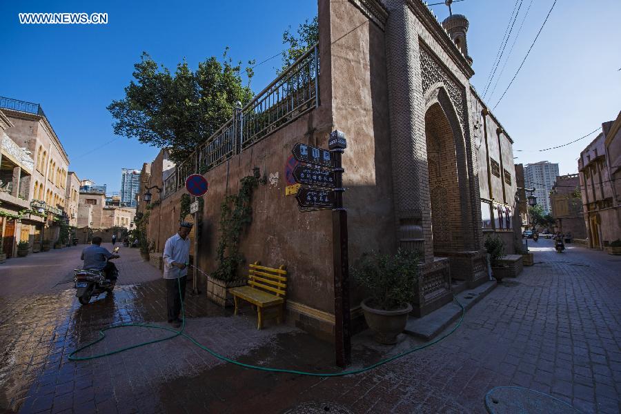 Photo taken on June 7, 2015 shows a street corner in the old town of the old town of Kax, northwest China's Xinjiang Uygur Autonomous Region. 