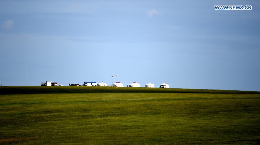 Photo taken on July 21, 2015 shows the scenery of a prairie in Xilinhot, north China's Inner Mongolia Autonomous Region. 