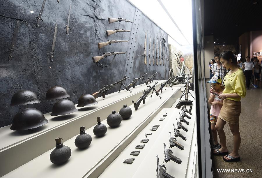 People visit the Taihang Memorial Hall of the Eighth Route Army in Wuxiang County, north China's Shanxi Province, July 29, 2015. The memorial hall was opened to the public in 1988 to depict the history of the Communist-led Eighth Route Army in the Chinese People's War of Resistance Against Japanese Aggressions from 1937 to 1945). (Xinhua/Yan Yan) 