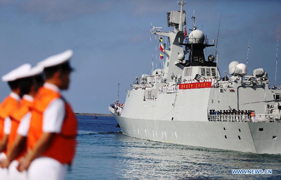 A Chinese Navy vessel prepare to sail at a naval port in Sanya, south China's Hainan Province, Agu. 4, 2015. 