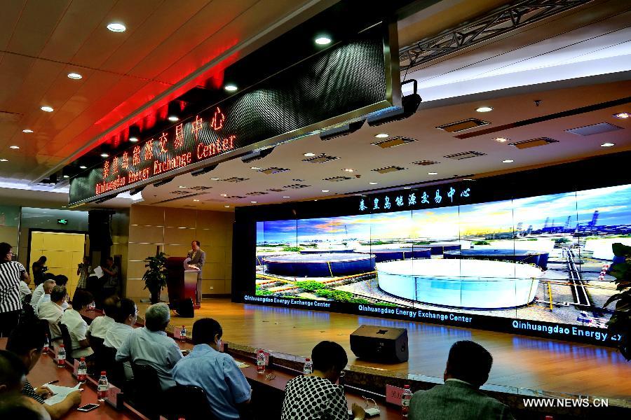 Photo taken on Aug. 11, 2015 shows the opening ceremony of the Qinhuangdao Energy Exchange Center in Qinhuangdao, north China's Hebei Province. The energy exchange center, which was put into use on Tuesday, is the first spot transaction center for refined oil products in north China. 
