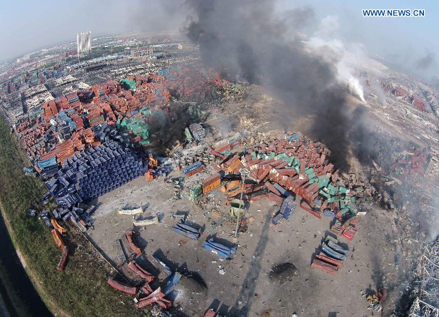 Fires in Tianjin 'initially controlled,' 18 firefighers still missing