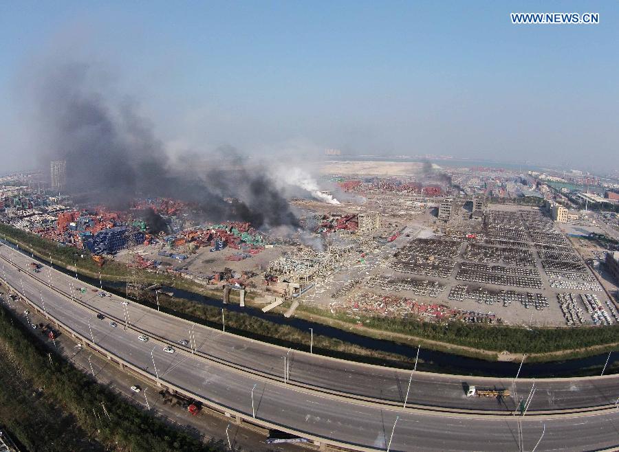 Fires in Tianjin 'initially controlled,' 18 firefighers still missing