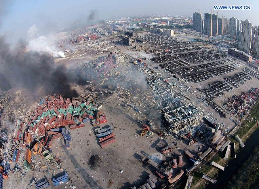 Fires in Tianjin 'initially controlled,' 18 firefighers still missing