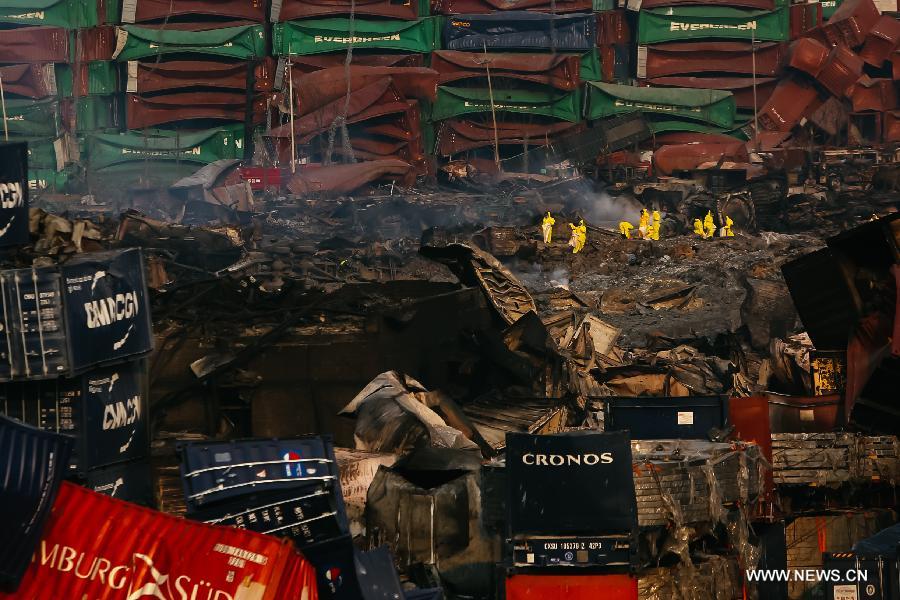 Rescuers work at the explosion site in north China's Tianjin Municipality, Aug. 16, 2015. 