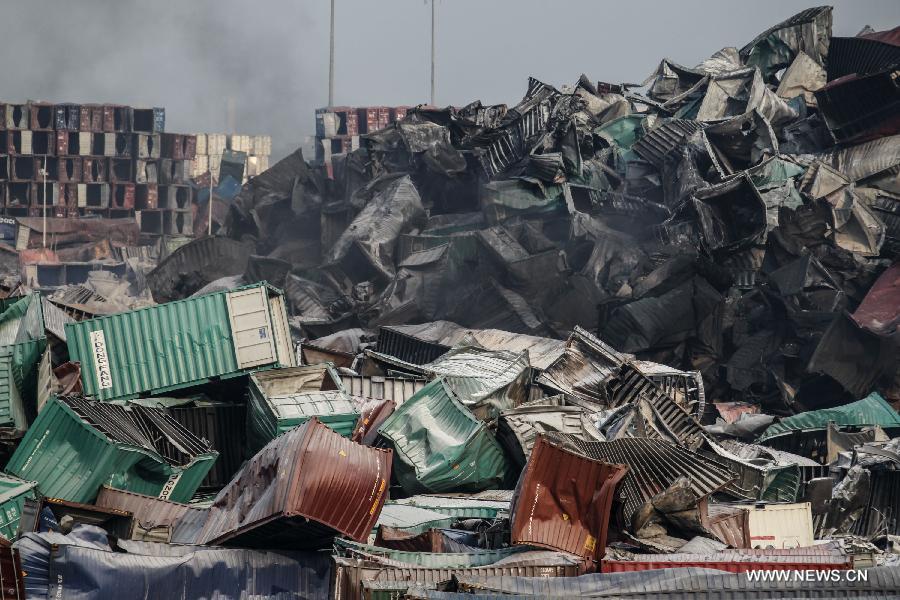 Photo taken on Aug. 16, 2015 shows damaged containers at the explosion site in north China's Tianjin Municipality.