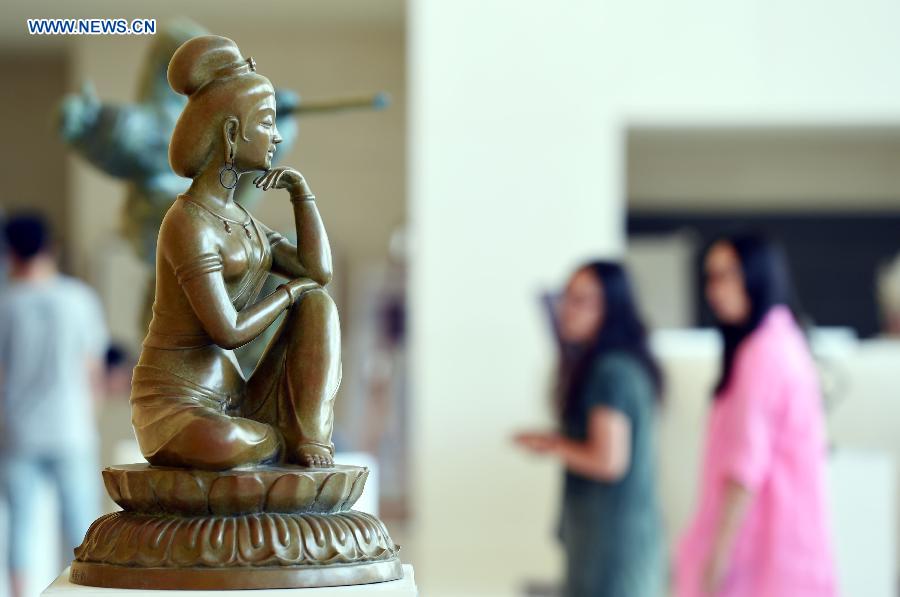 Photo taken on Aug. 17, 2015 shows a sculpture during an exhibition at Gansu Theater in Lanzhou, capital of northwest China's Gansu Province. 