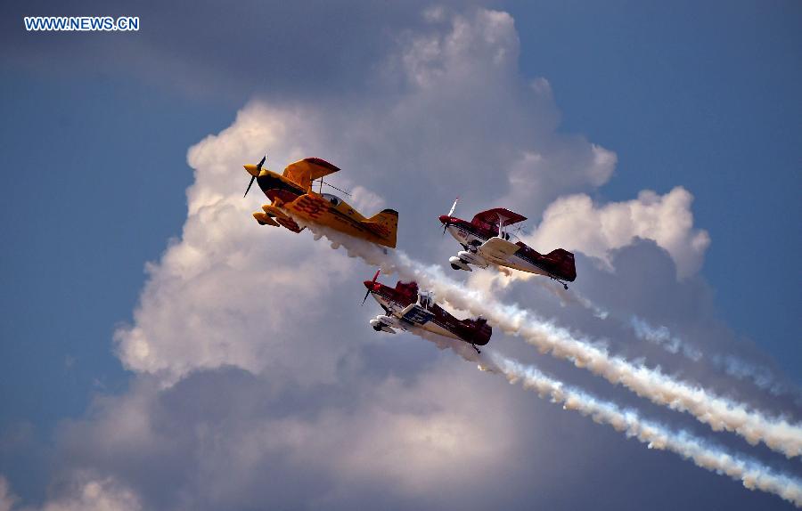 Aircraft from Australia show aerobatics at the 2015 Shenyang Faku International Flight Convention, in Faku County of Shenyang, capital of northeast China's Liaoning Province, Aug. 21, 2015. 