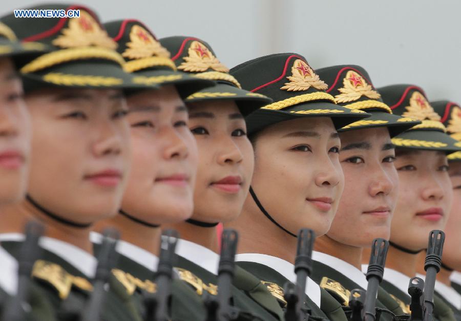 Photo taken on Aug. 19, 2015 shows soldiers participating in training for the Sept. 3 military parade at the parade training base in Beijing. 