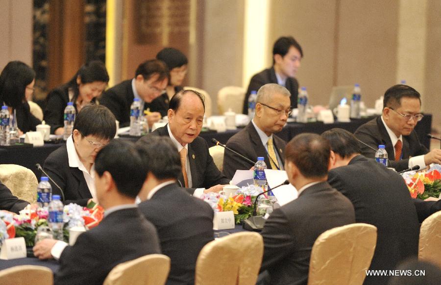 Straits Exchange Foundation (SEF) chairman Lin Join-sane addresses the 11th round of talks between negotiators from the Chinese mainland's Association for Relations Across the Taiwan Straits (ARATS) and Taiwan-based Straits Exchange Foundation (SEF), in Fuzhou, capital of southeast China's Fujian Province, Aug. 25, 2015.