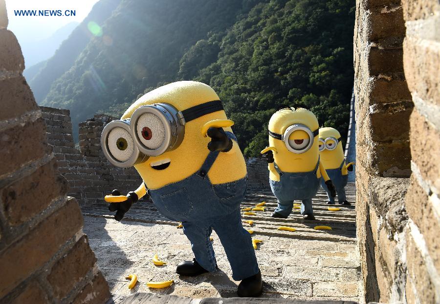 The three leading characters in the 3D animation movie 'Minions' Stuart, Kevin and Bob got on the Great Wall to say hi to the Chinese audience on Saturday, which also opened their promotion travel in China. The movie will be released in China on Sept. 13.