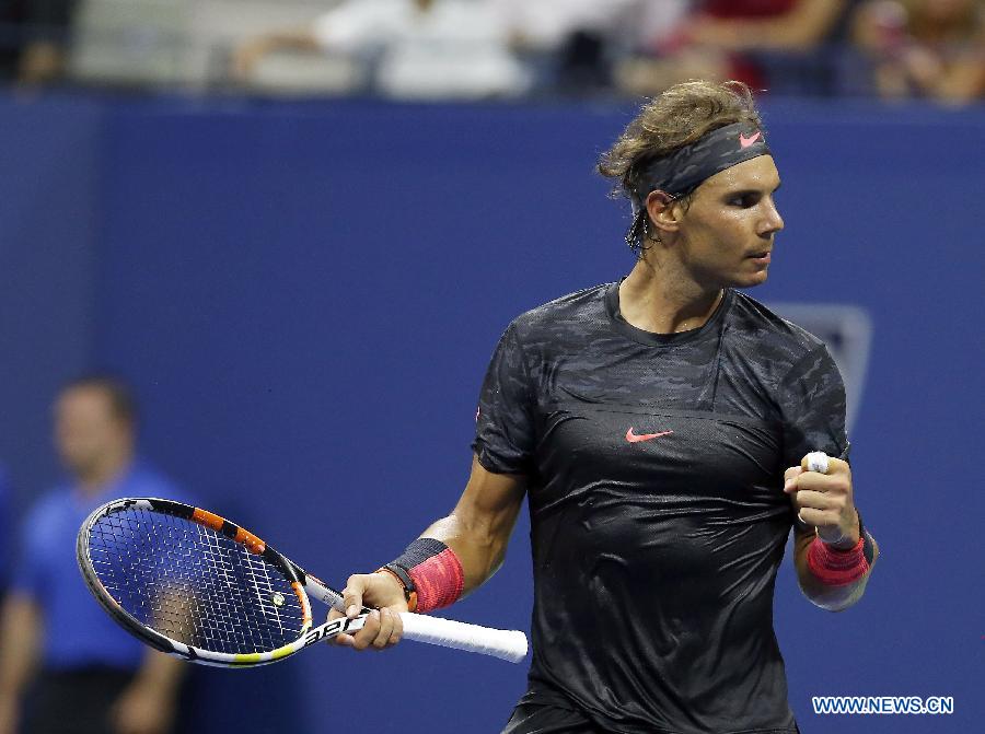 Rafael Nadal of Spain celebrates during the men's singles first round match against Borna Coric of Croatia at the 2015 U.S. Open in New York, the United States, Aug. 31, 2015.  