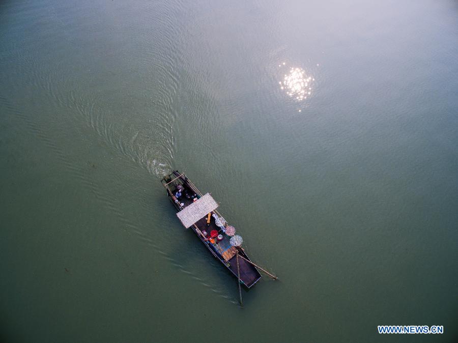 Fishermen of Huanlou Village fish in the Taihu Lake, east China's Zhejiang Province, Sept. 1, 2015. The fishing season of the Taihu Lake began on Tuesday. 