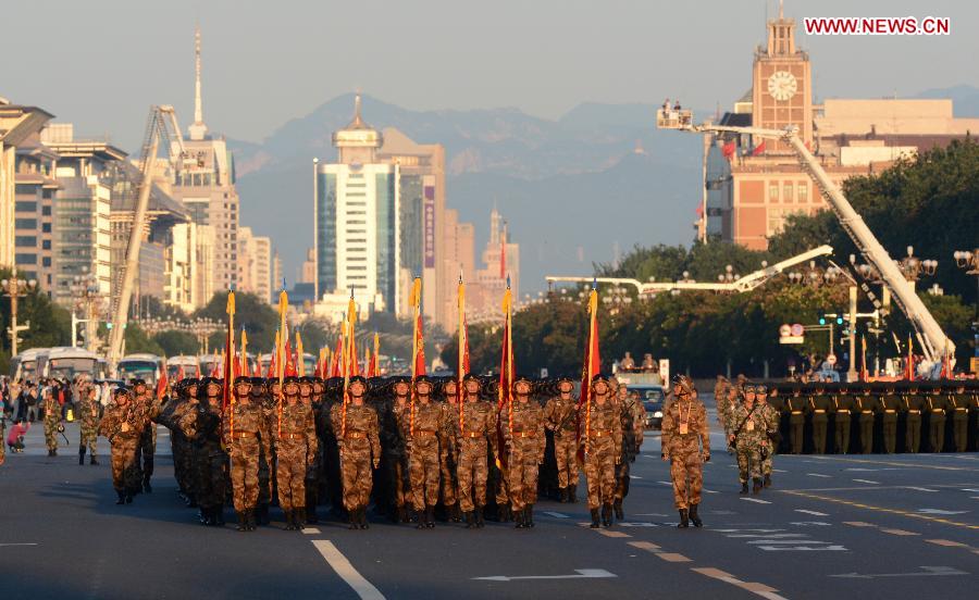 Soldiers prepare for the commemoration activities to mark the 70th anniversary of the victory of the Chinese People's War of Resistance Against Japanese Aggression and the World Anti-Fascist War, in Beijing, capital of China, Sept. 3, 2015. 