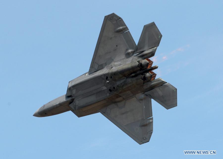 An F-22 Raptor performs during an air show at Andrews Air Base outside Washington D.C. in Maryland, the United States, Sept. 19, 2015.