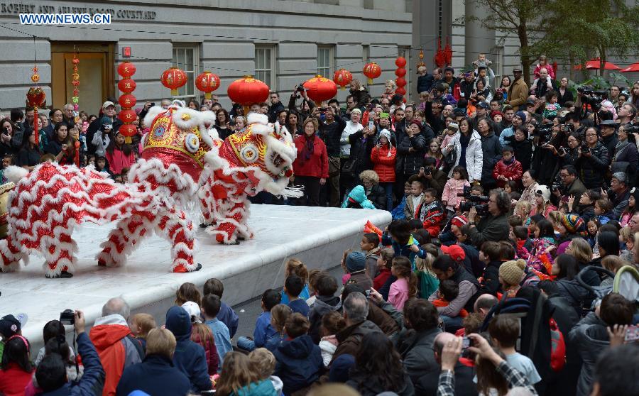 File photo taken on Jan. 25, 2014 shows audience watch lion dance at the Smithsonian American Art Museum in Washington D.C., capital of the United States.