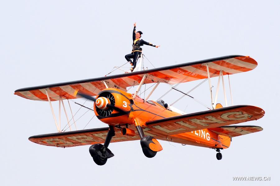 Breitling Jet Team perform aerobatics at Zhengzhou Airshow 2015 in Zhengzhou, capital of central China's Henan Province, Sept. 26, 2015.